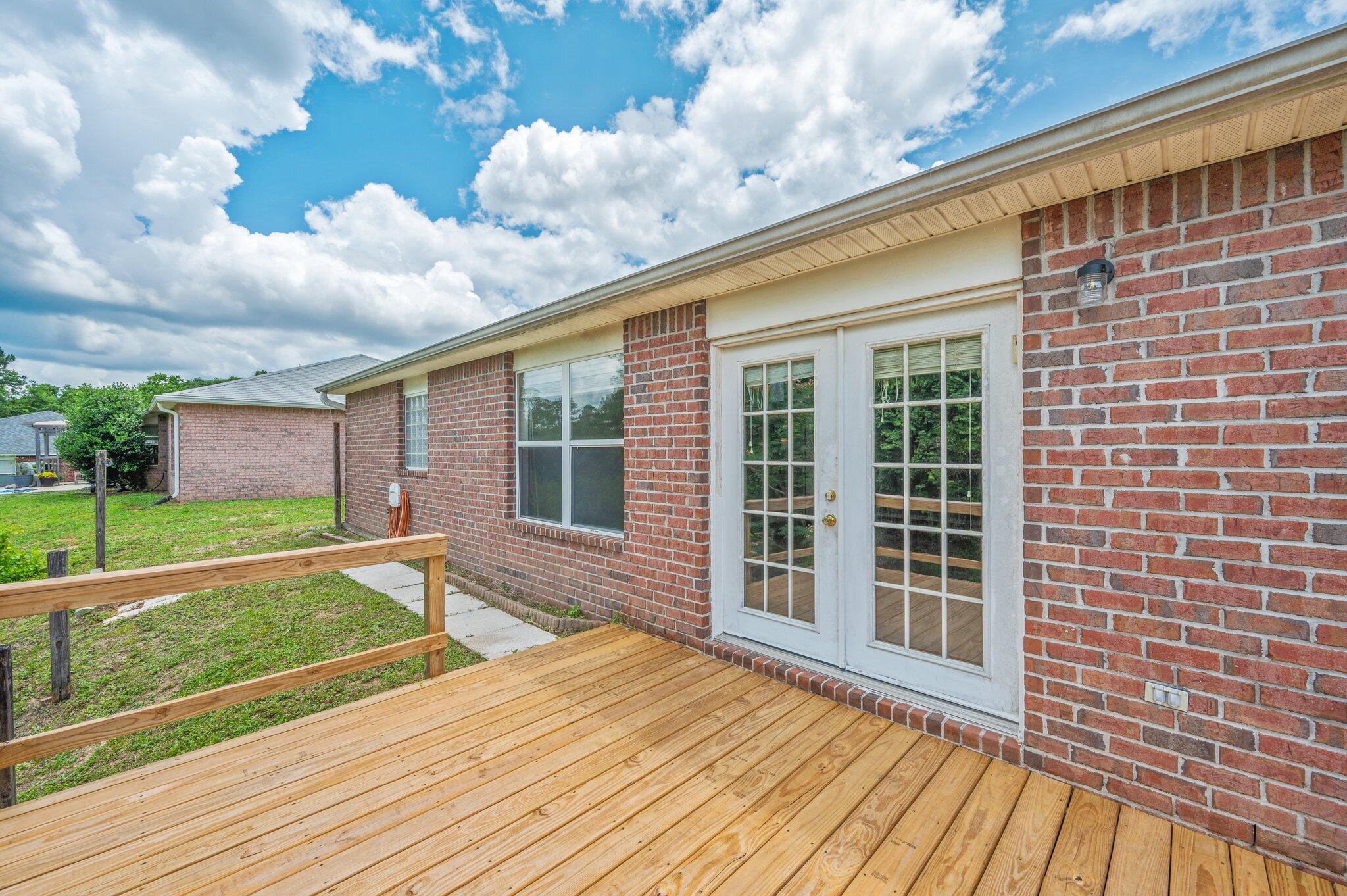 488 Jillian Drive Crestview, FL 32536 - Photo 29 of 29 a view of a house with a backyard