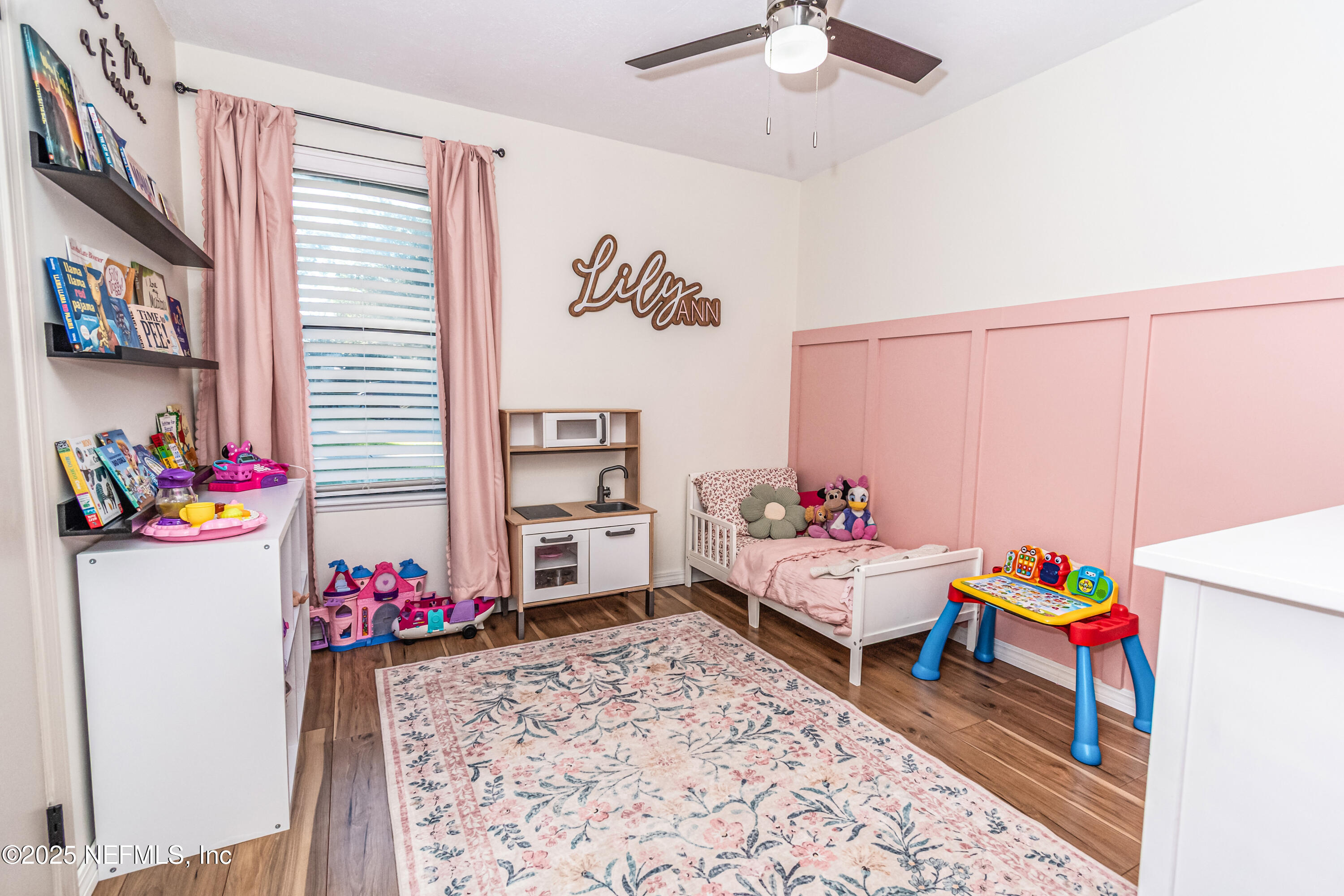 311 North 4th Street Macclenny, FL 32063 - Photo 19 of 35 a playing room with toys and a chandelier