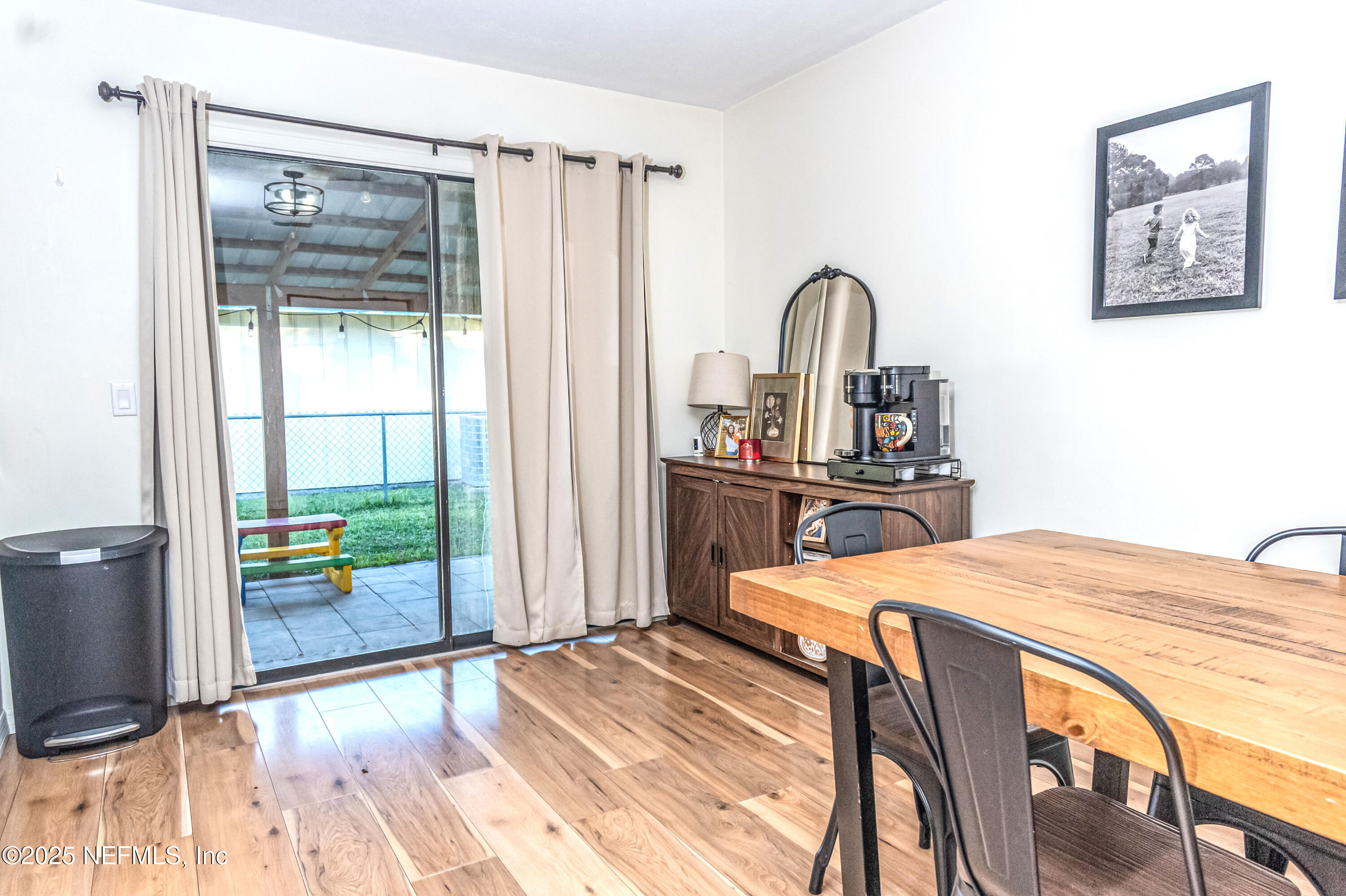 311 North 4th Street Macclenny, FL 32063 - Photo 26 of 35 a dining room with a table and chairs