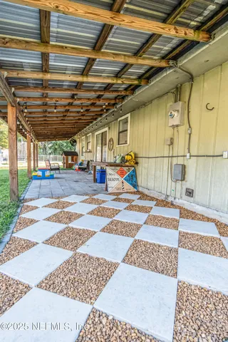 a view of a porch with a rug