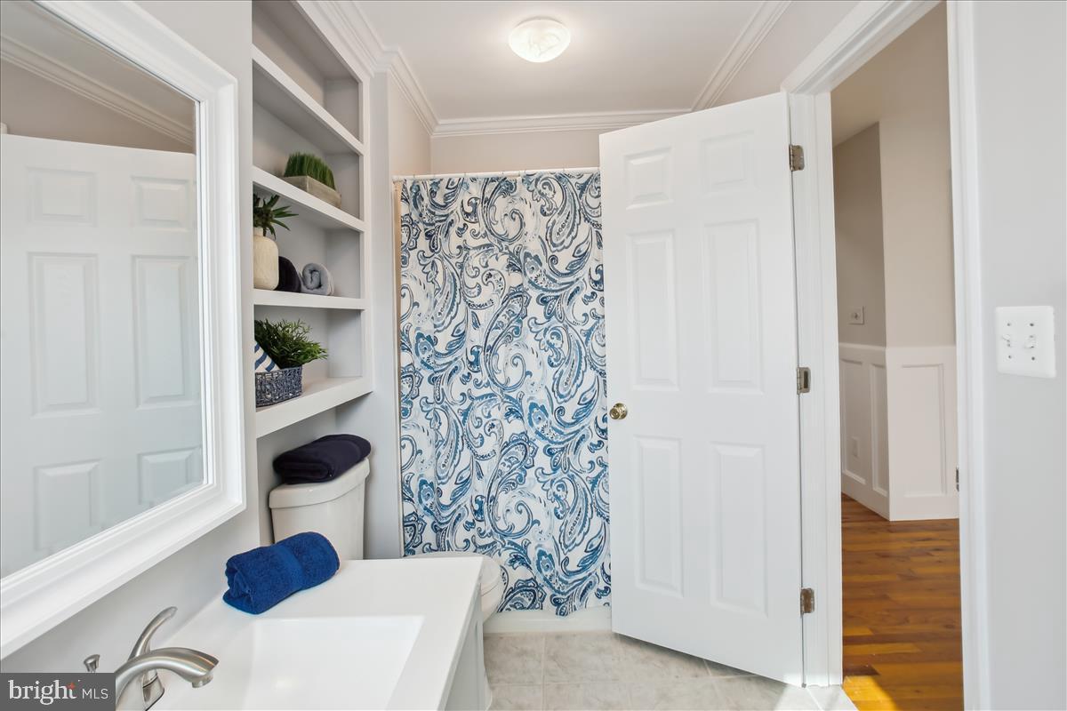 20702 Pomeroy Court Ashburn, VA 20147 - Photo 36 of 60 a view of living room with furniture and floor to ceiling window
