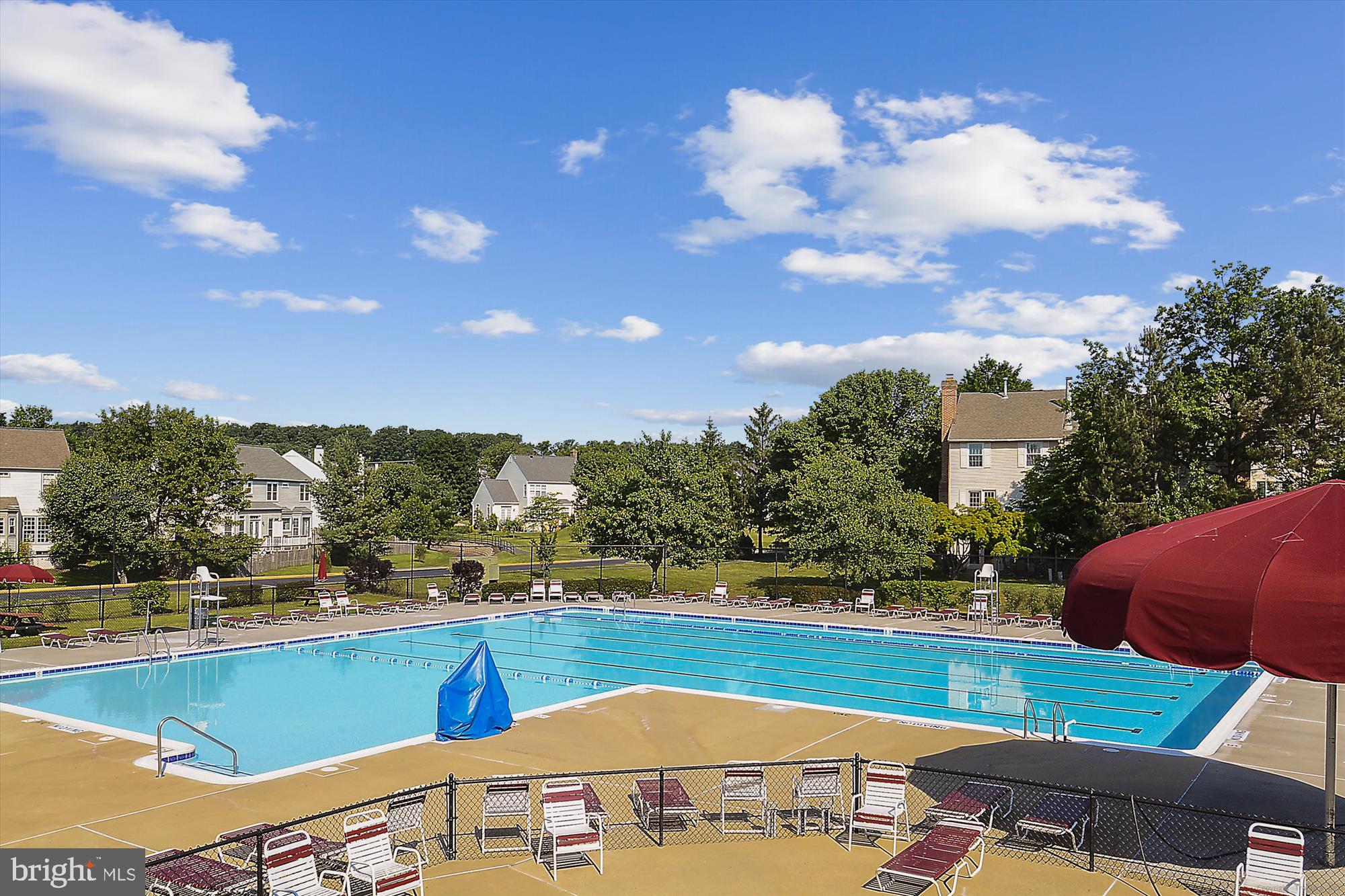 20702 Pomeroy Court Ashburn, VA 20147 - Photo 53 of 60 a view of a swimming pool with a lake view and mountain view
