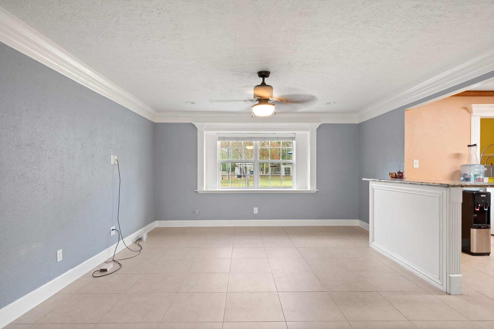 6742 Dusty Lane Conroe, TX 77306 - Photo 33 of 33 Living area located off kitchen breakfast bar offers more of an open floor plan for this home.