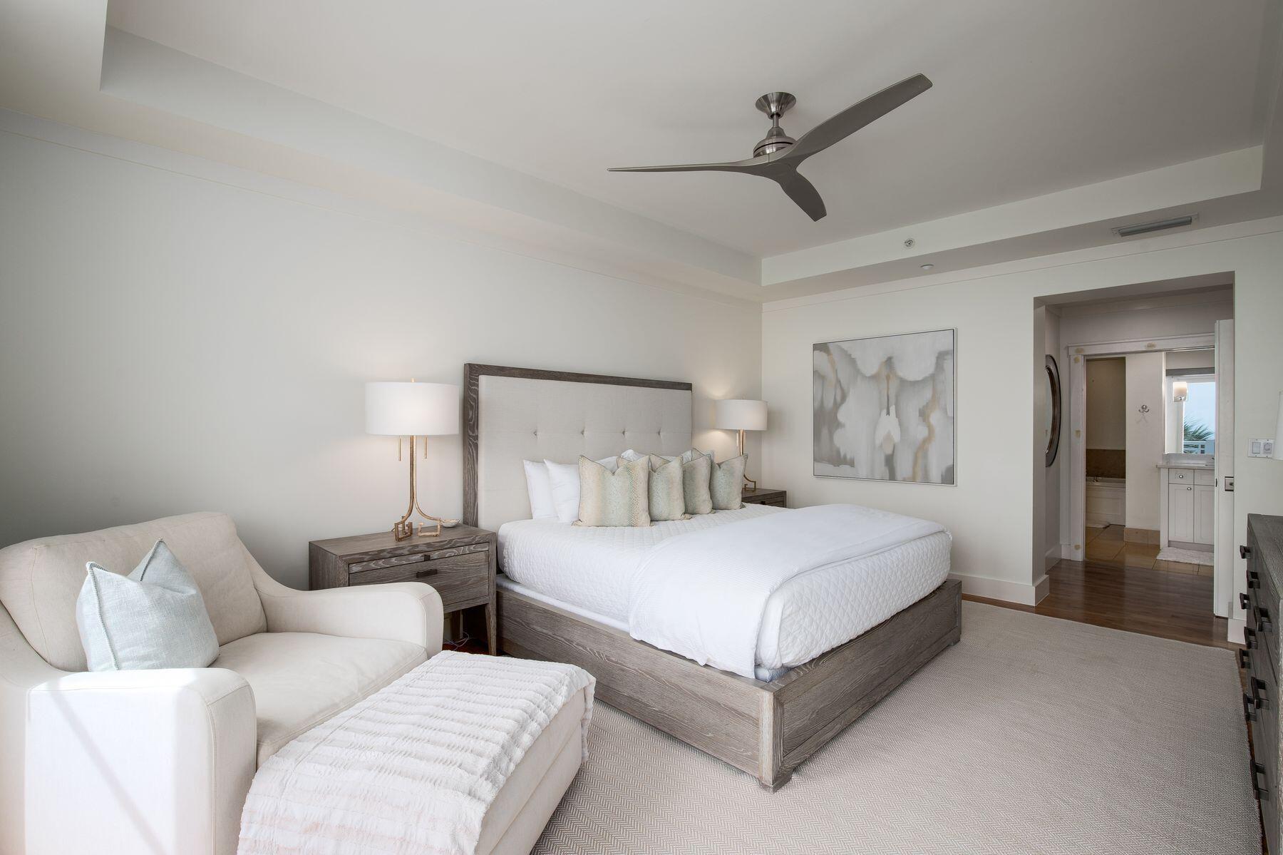 337 Bridge Lane, Unit 312B Watersound, FL 32461 - Photo 11 of 37 a bedroom with a bed couch and window
