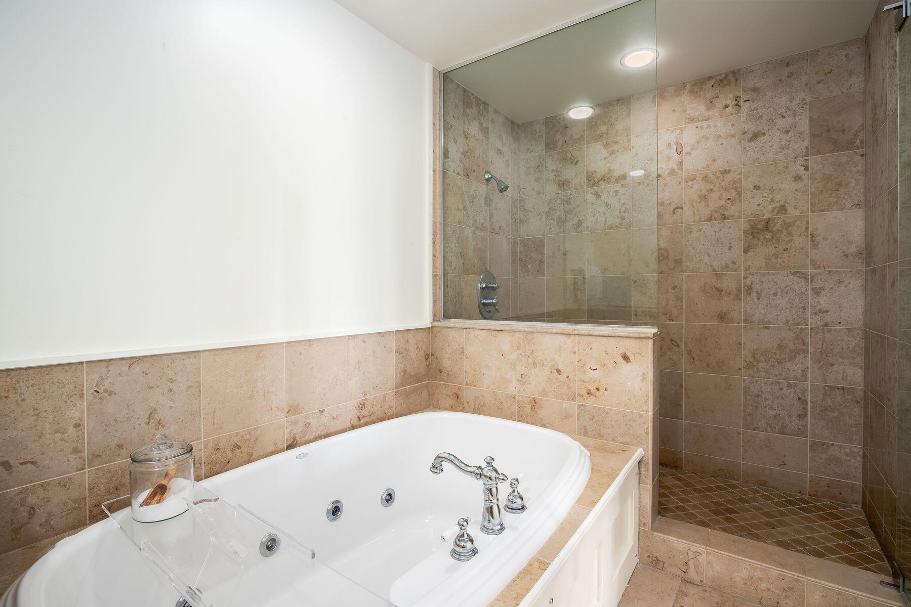 337 Bridge Lane, Unit 312B Watersound, FL 32461 - Photo 13 of 37 a bathroom with a bathtub and shower