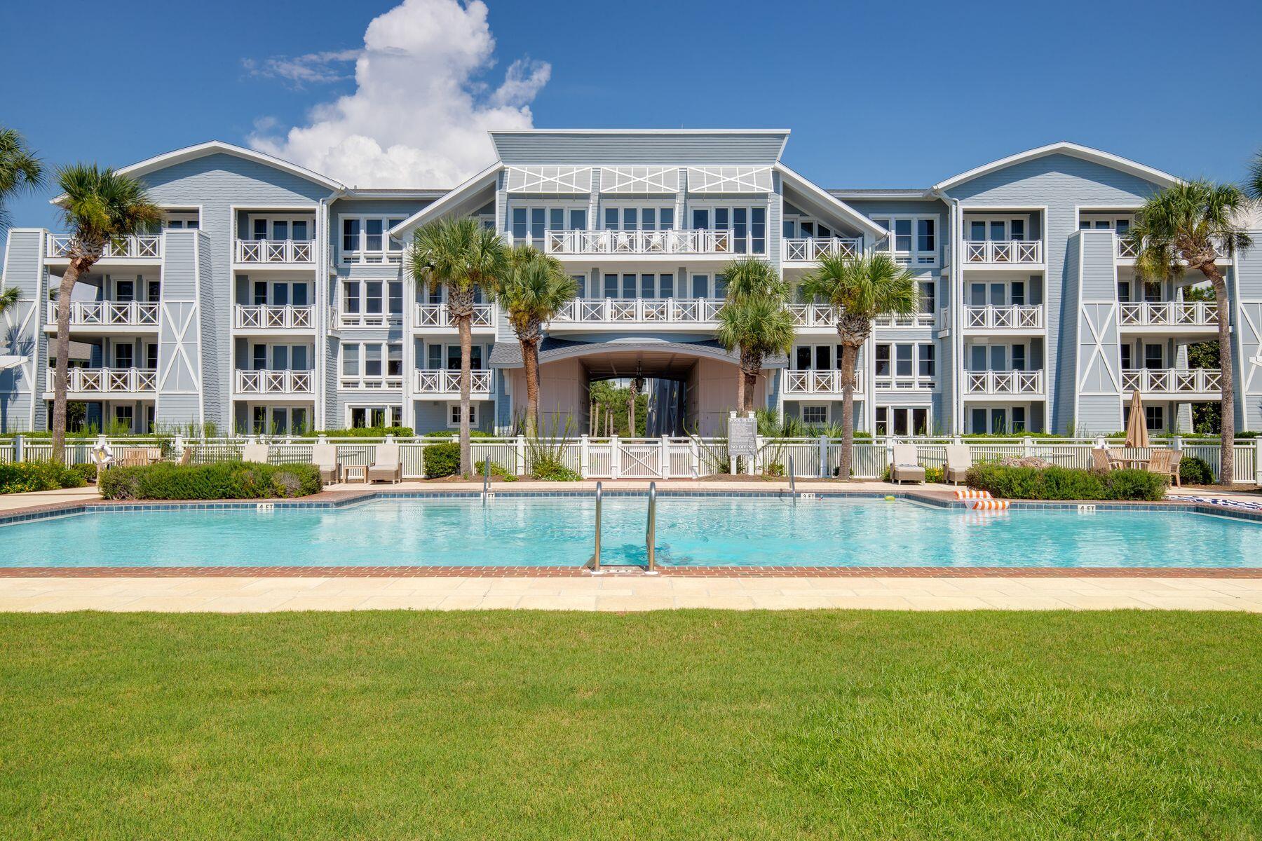 337 Bridge Lane, Unit 312B Watersound, FL 32461 - Photo 24 of 37 a front view of building with yard