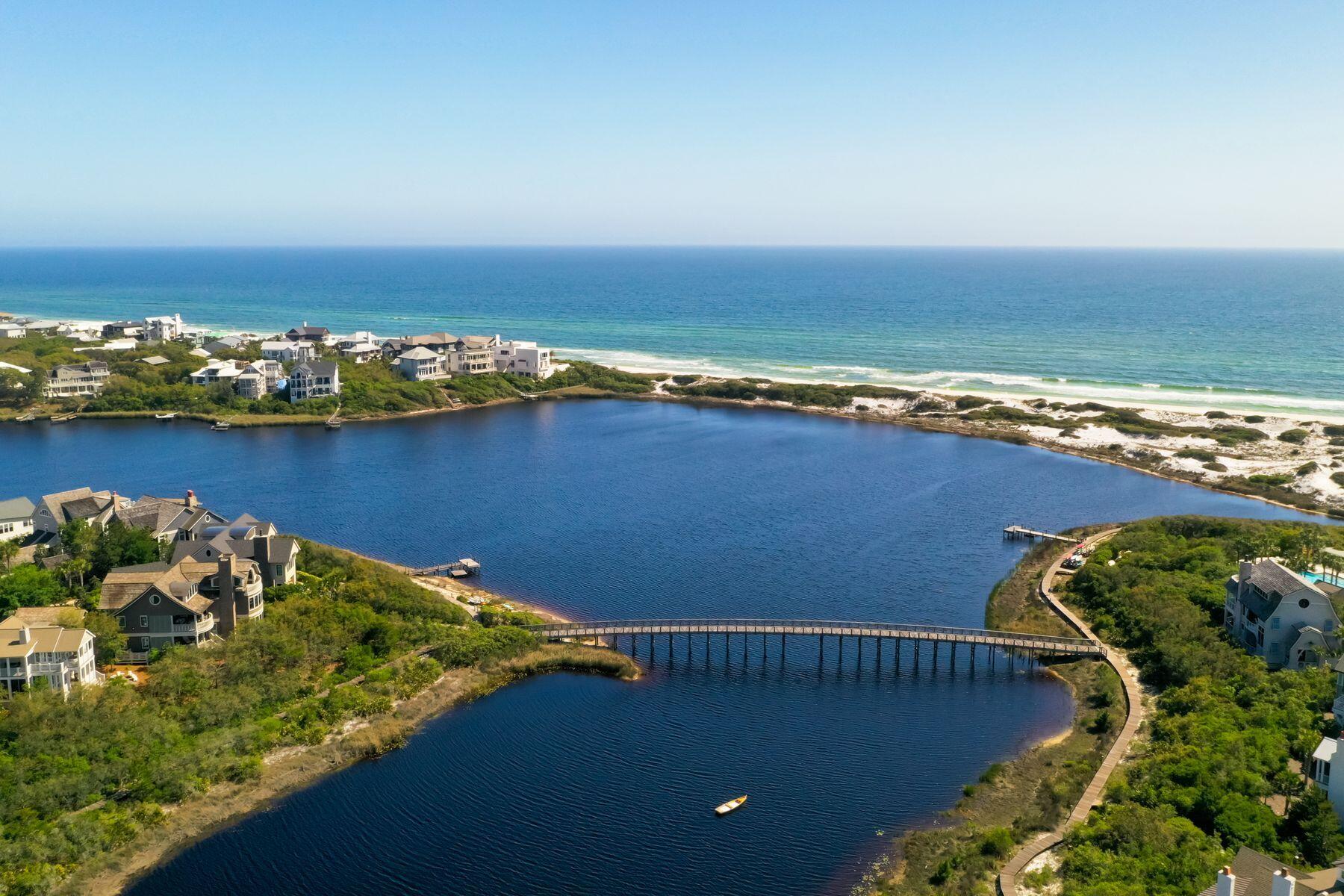 337 Bridge Lane, Unit 312B Watersound, FL 32461 - Photo 32 of 37 an aerial view of a houses with a lake view