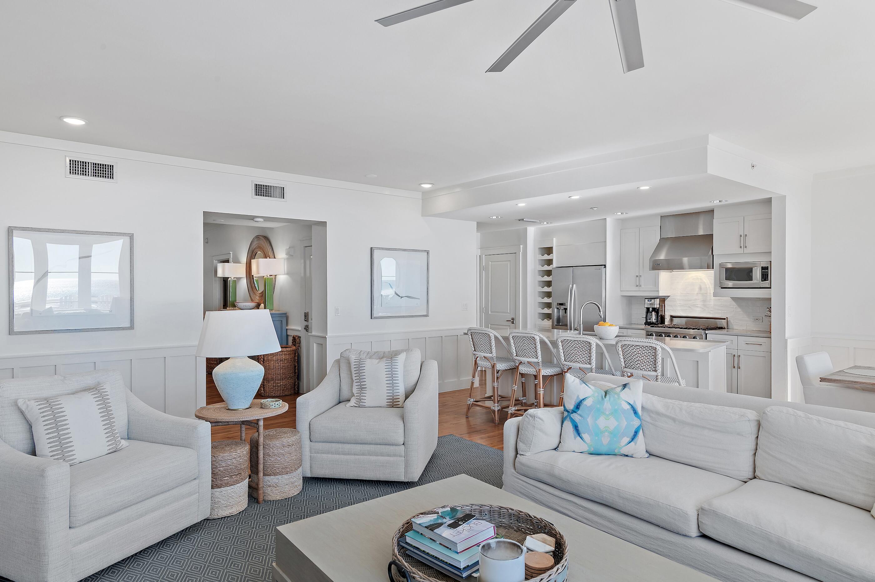 337 Bridge Lane, Unit 312B Watersound, FL 32461 - Photo 5 of 37 a living room with furniture white walls and white walls