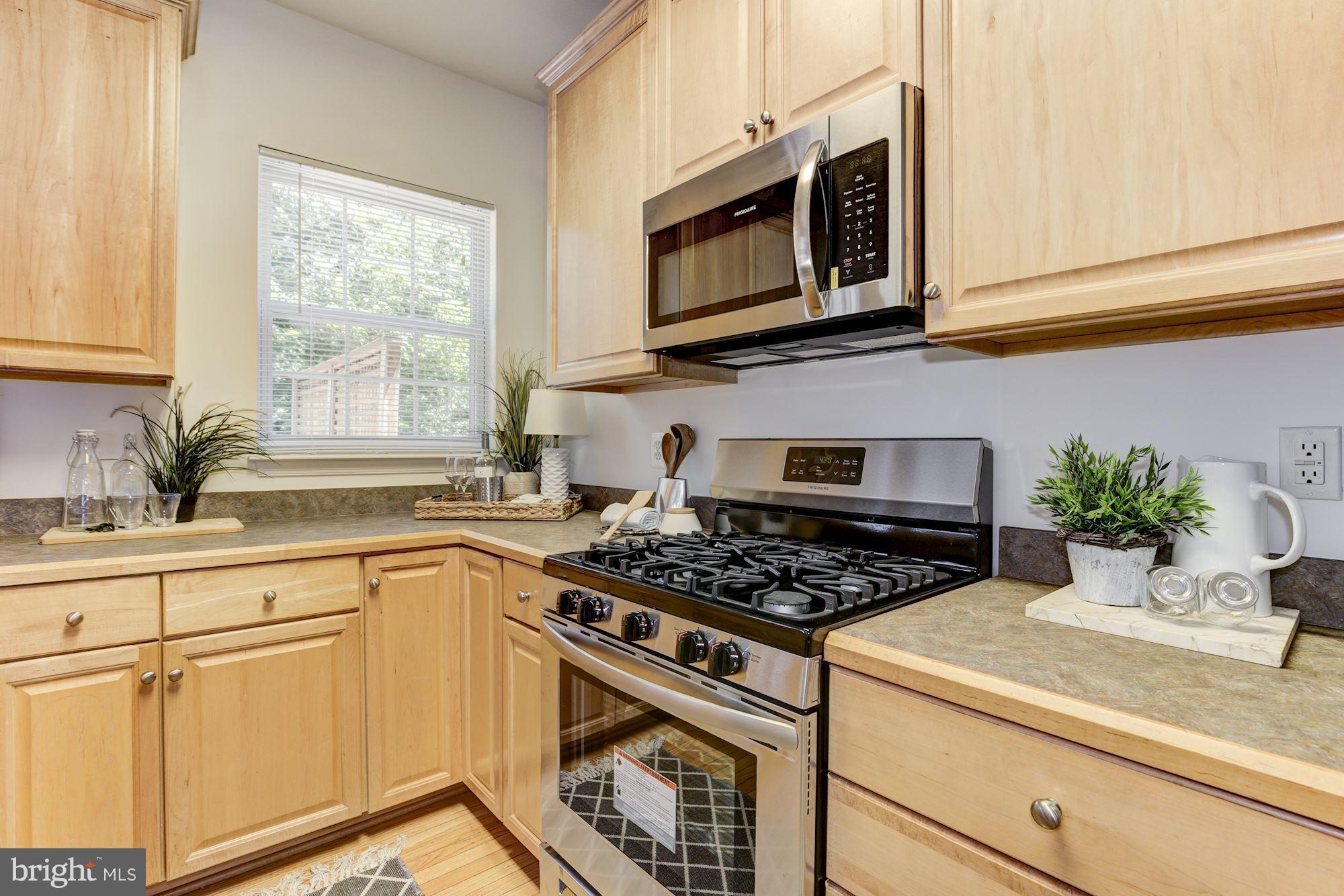 11016 Hemingway Court Silver Spring, MD 20902 - Photo 11 of 28 Kitchen has 5 burner gas stove