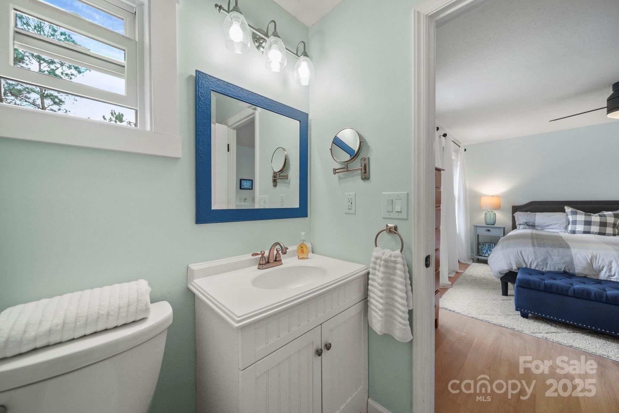 1215 Molokai Drive Fort Mill, SC 29708 - Photo 15 of 25 a en suite bathroom with a toilet sink and mirror