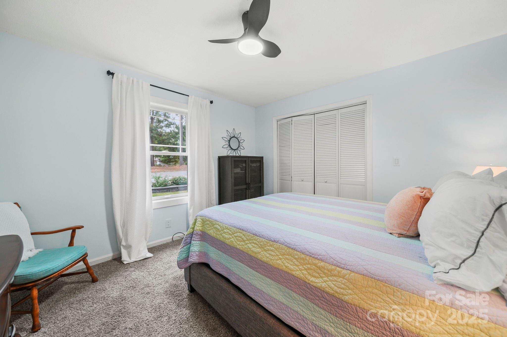 1215 Molokai Drive Fort Mill, SC 29708 - Photo 18 of 25 a bedroom with a bed and a window
