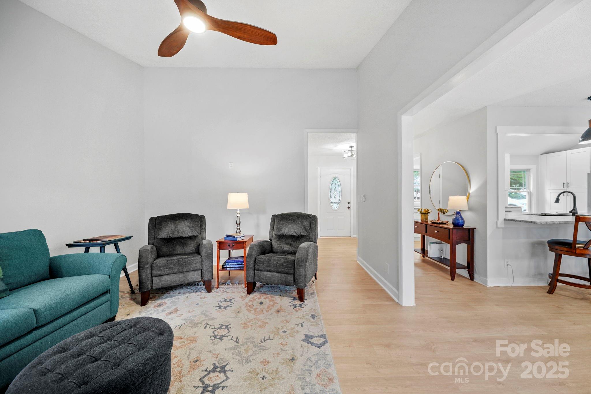 1215 Molokai Drive Fort Mill, SC 29708 - Photo 4 of 25 a living room with furniture and a flat screen tv