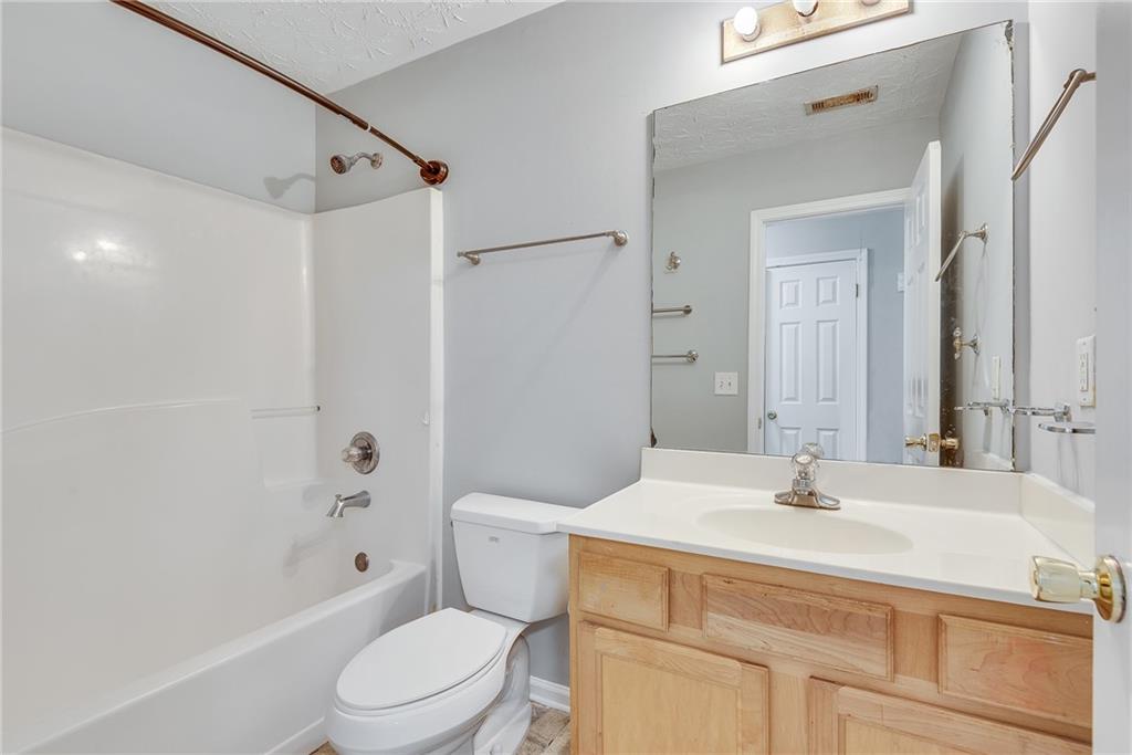 3337 Baymount Way Lawrenceville, GA 30043 - Photo 37 of 47 a bathroom with a sink toilet vanity and shower
