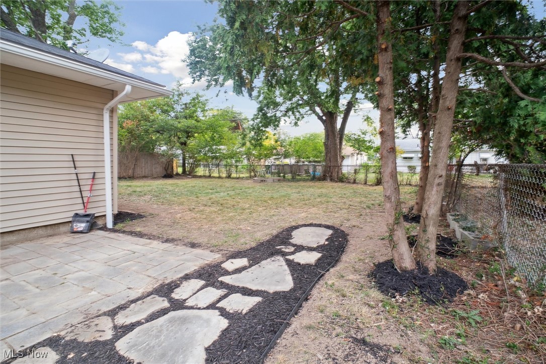 8796 West Ridgewood Drive Cleveland, OH 44130 - Photo 38 of 38 View of yard featuring a patio