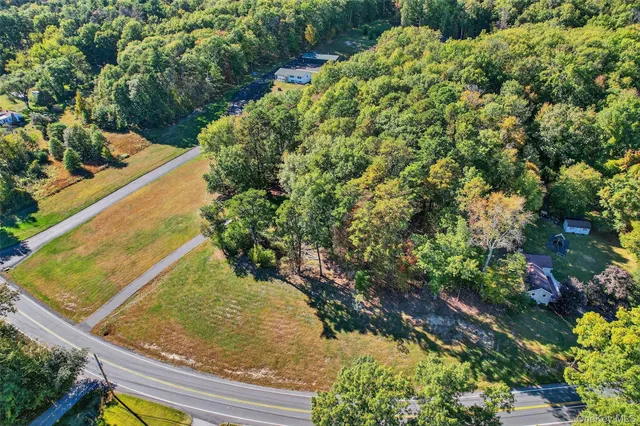 a view of swimming pool from a balcony