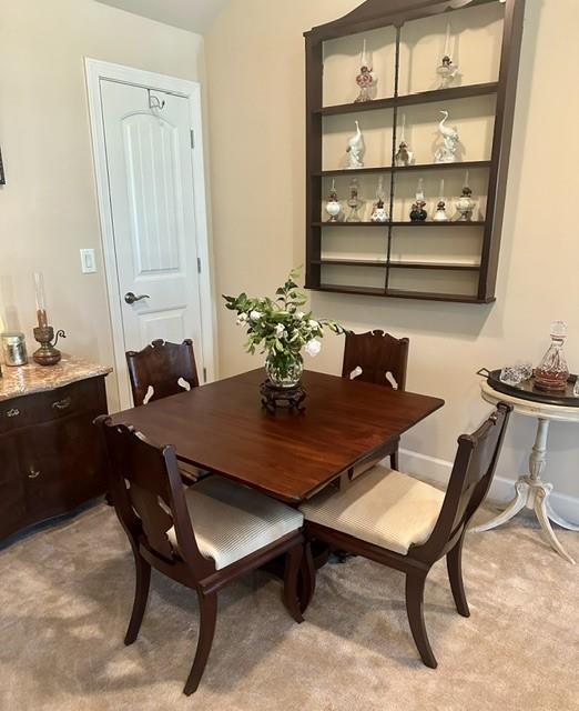 104 Willow Overlook Canton, GA 30115 - Photo 26 of 27 a dining room with furniture and wooden floor