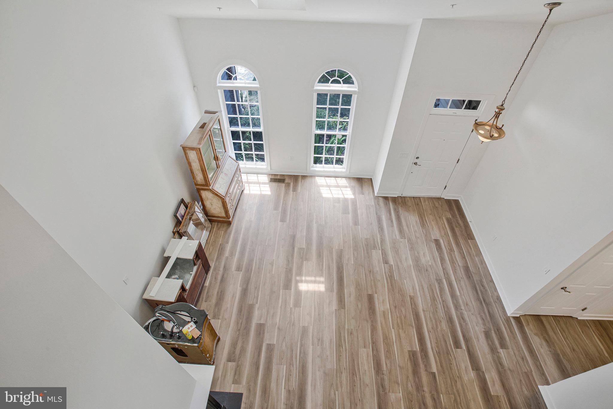 322 Hamlet Circle Edgewater, MD 21037 - Photo 20 of 21 wooden floor in a hall with an entryway