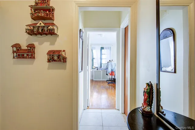 a living room with furniture a fireplace and a large window