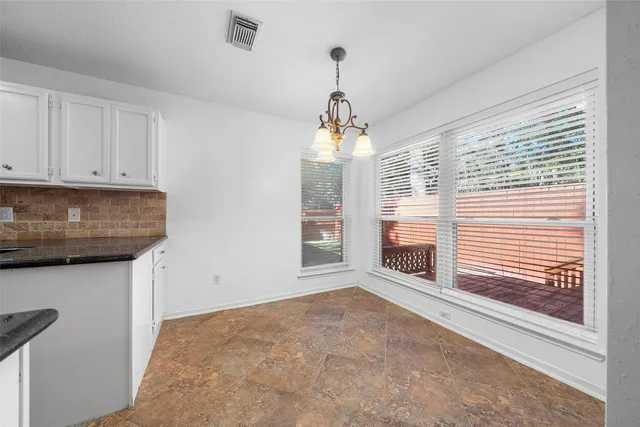 a view of livingroom with furniture and window