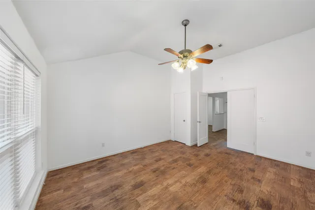 a view of a livingroom with wooden floor