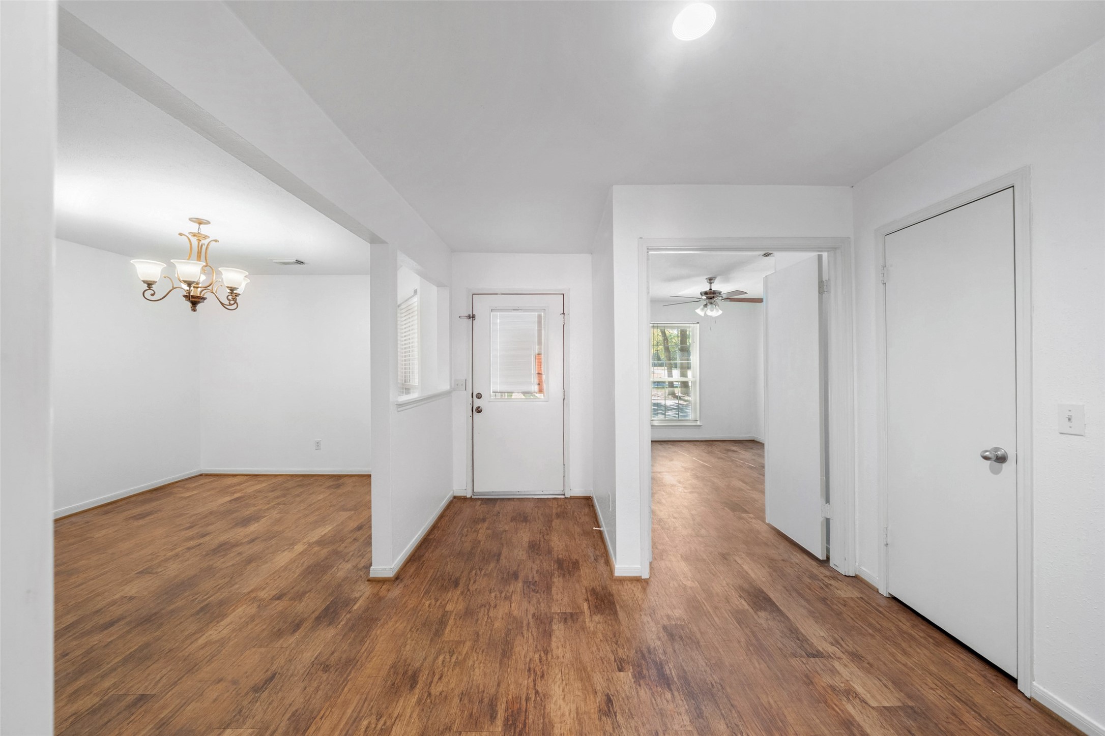 107 Sandpebble Drive The Woodlands, TX 77381 - Photo 18 of 30 a view of a livingroom with wooden floor
