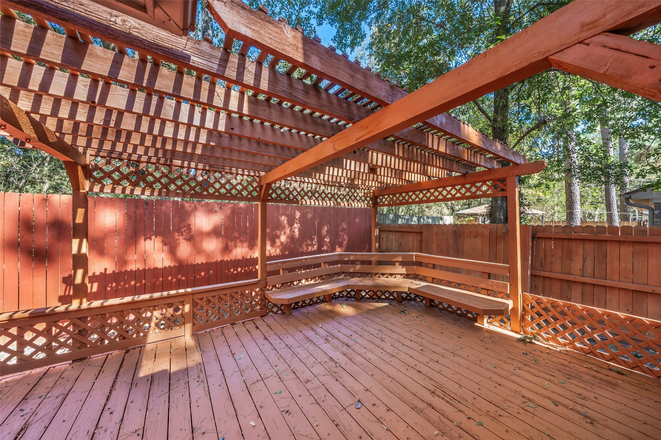 107 Sandpebble Drive The Woodlands, TX 77381 - Photo 29 of 30 a view of outdoor space with wooden floor