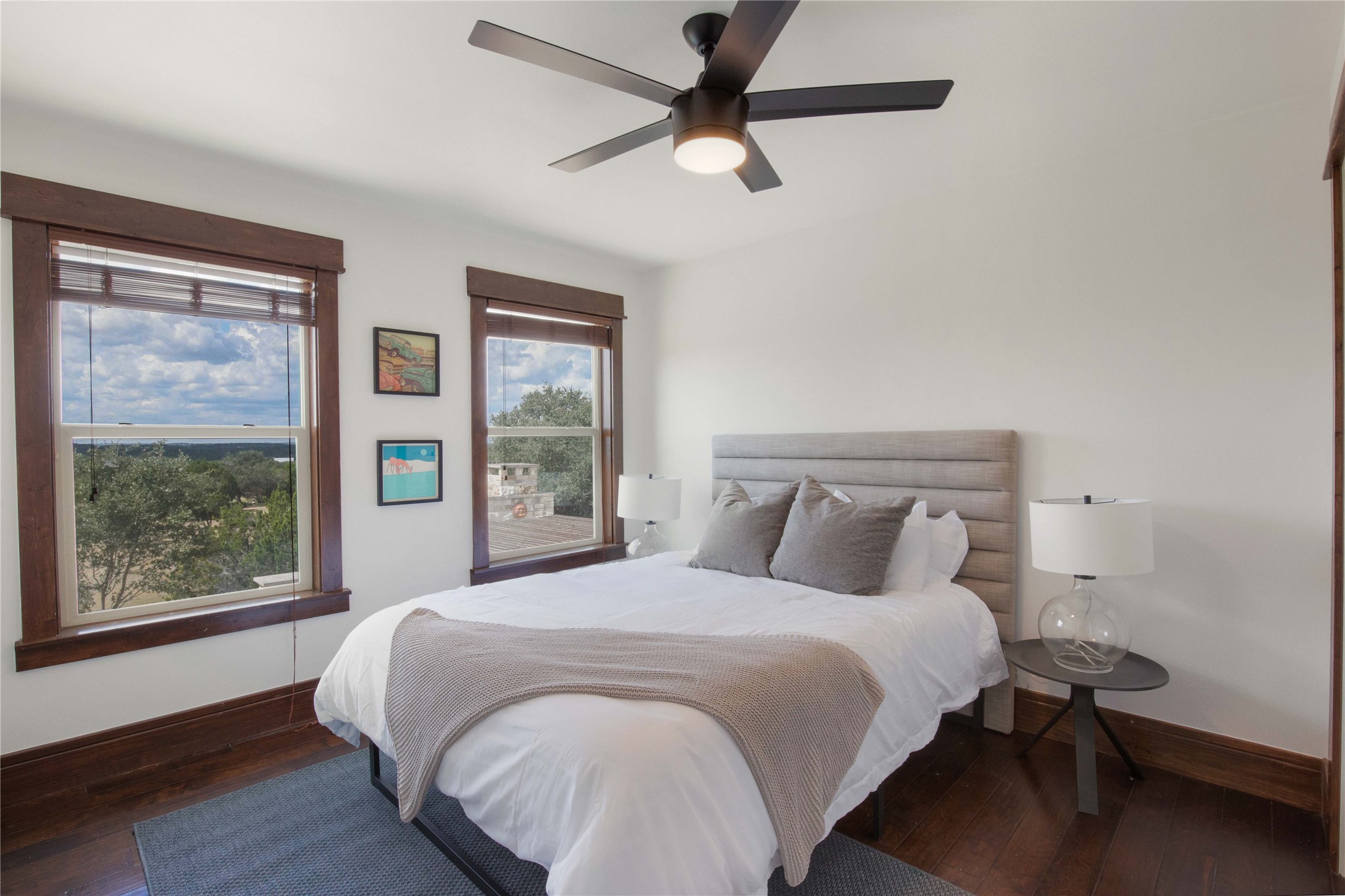 11209 Southwest Oaks Austin, TX 78737 - Photo 19 of 34 Bedroom featuring dark wood-type flooring and a ceiling fan