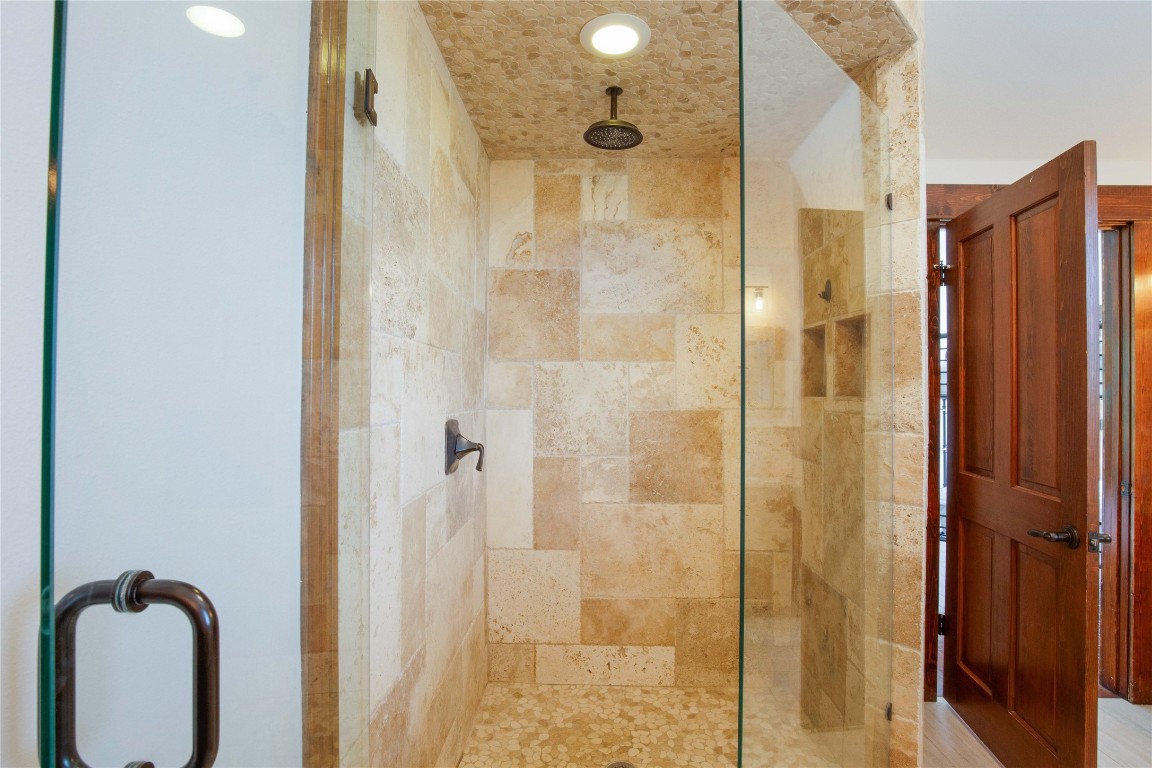 11209 Southwest Oaks Austin, TX 78737 - Photo 26 of 34 Bathroom with a tile shower and recessed lighting