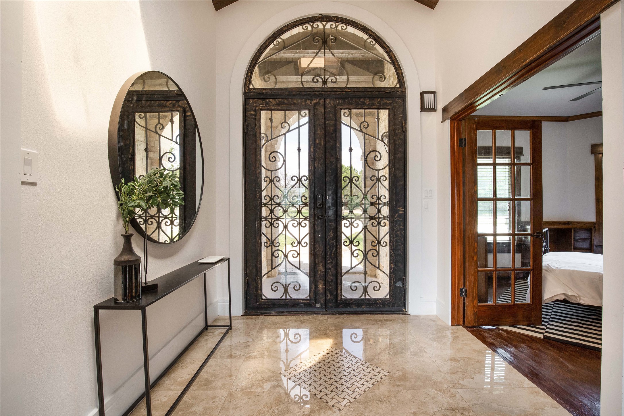 11209 Southwest Oaks Austin, TX 78737 - Photo 32 of 34 Foyer entrance with french doors and marble tiled floors