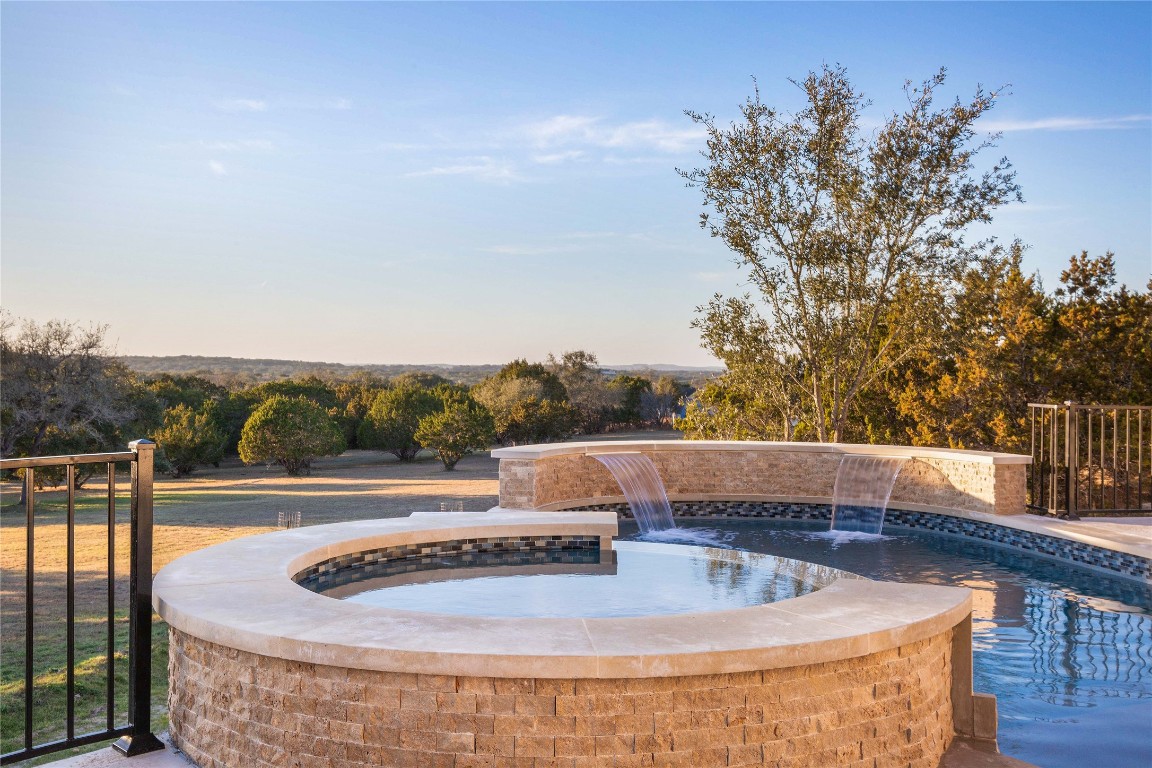 11209 Southwest Oaks Austin, TX 78737 - Photo 5 of 34 View of pool at dusk