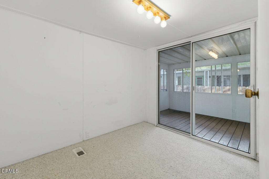 1225 South Rice Road, Unit 41 Ojai, CA 93023 - Photo 22 of 38 an empty room with windows