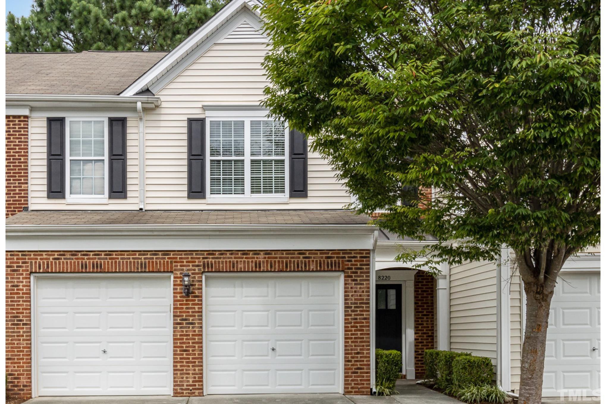 8220 Pilots View Drive Raleigh, NC 27617 - Photo 1 of 20 a front view of a house with a tree