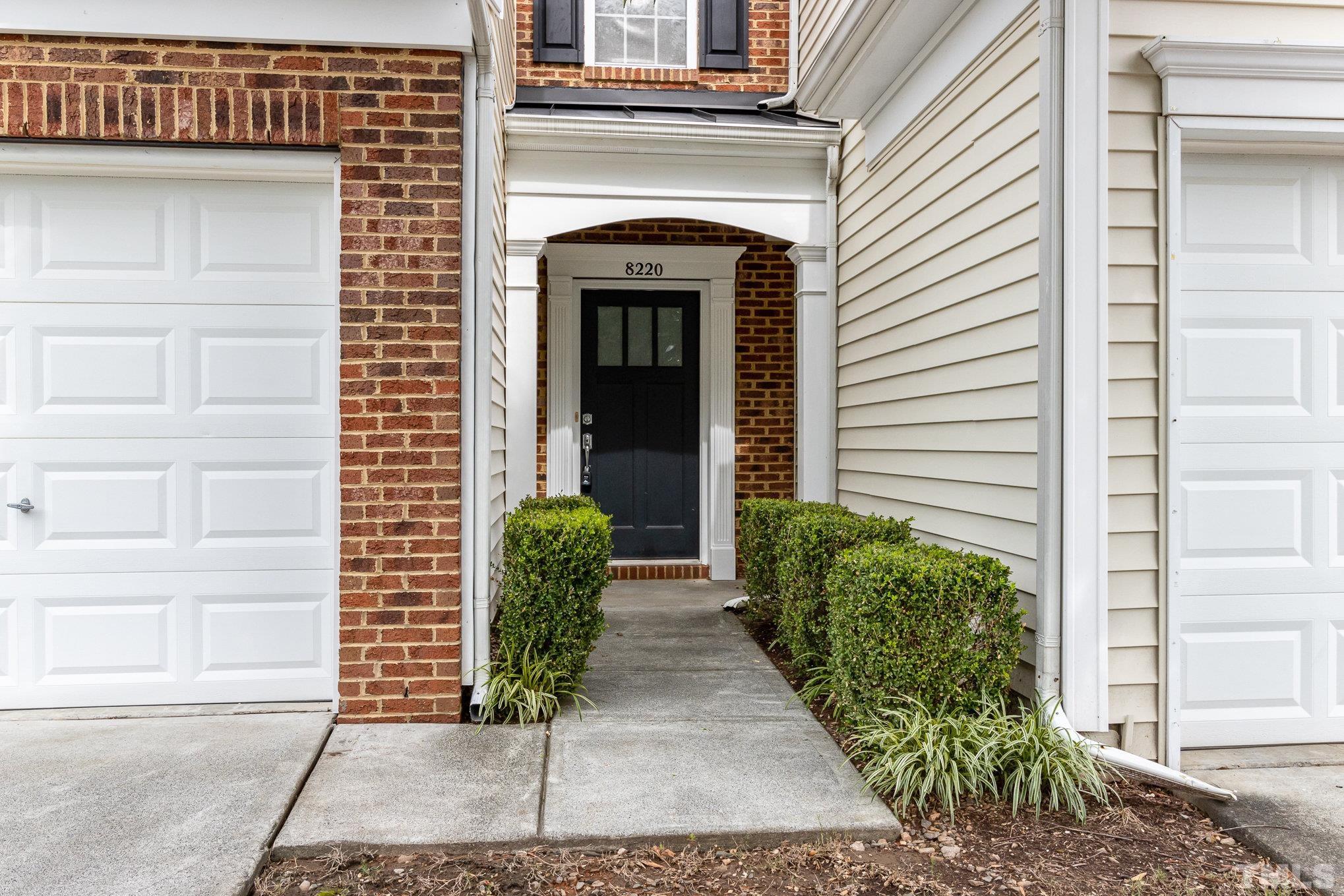 8220 Pilots View Drive Raleigh, NC 27617 - Photo 2 of 20 a view of the entrance of the house