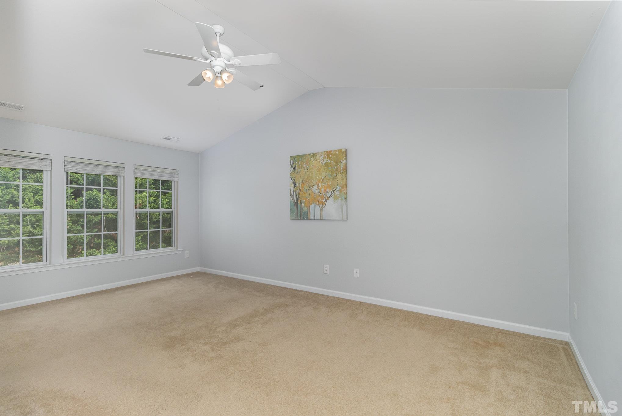 8220 Pilots View Drive Raleigh, NC 27617 - Photo 10 of 20 a view of an empty room with a window