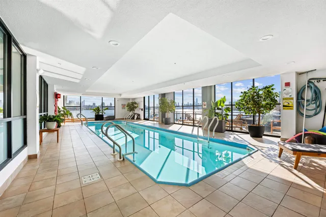 a view of a living room and dining room
