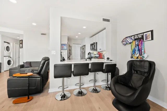 a work room with furniture and gym equipment