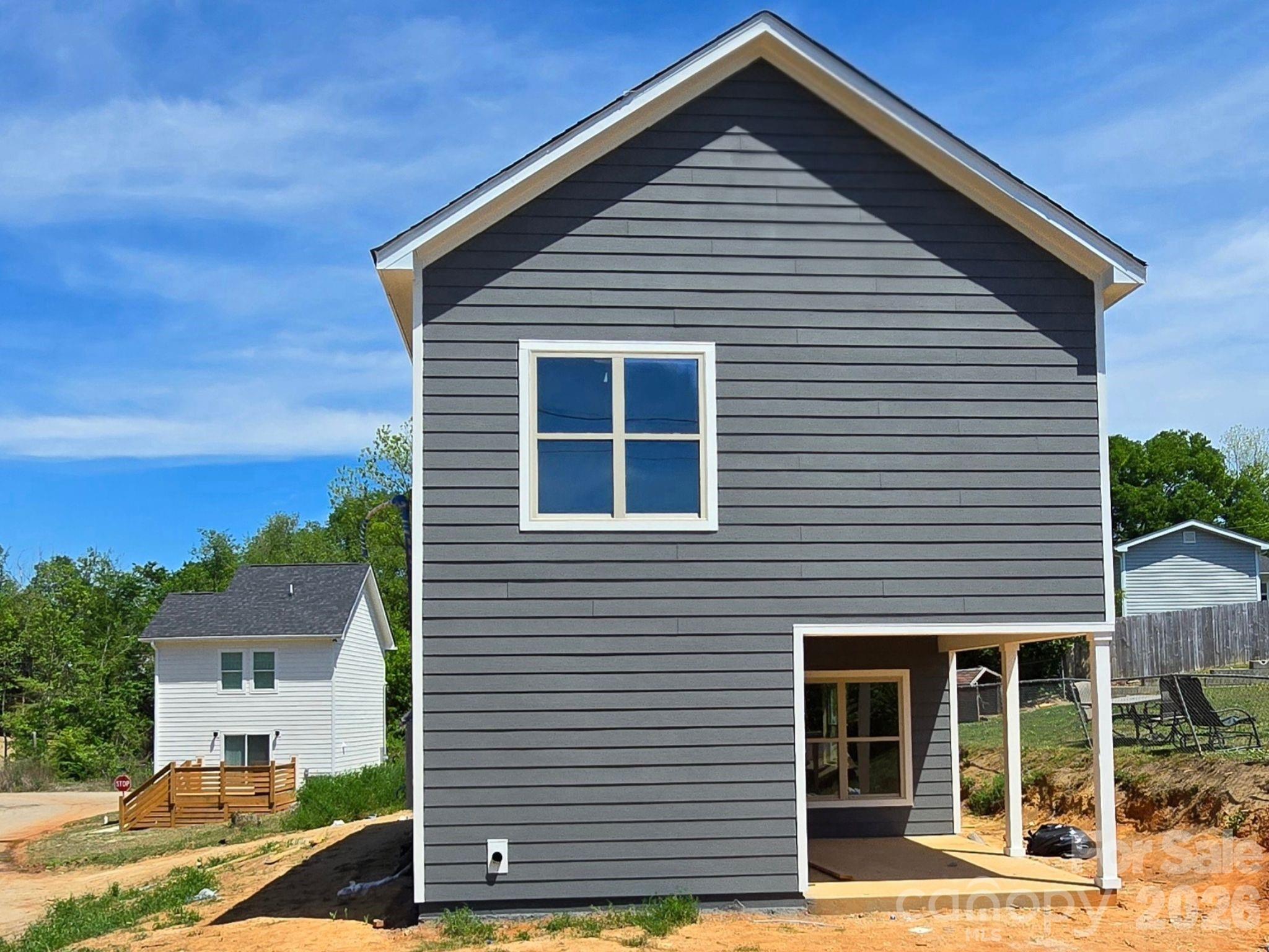 1128 5th Street Lancaster, SC 29720 - Photo 2 of 5 a front view of a house with a yard