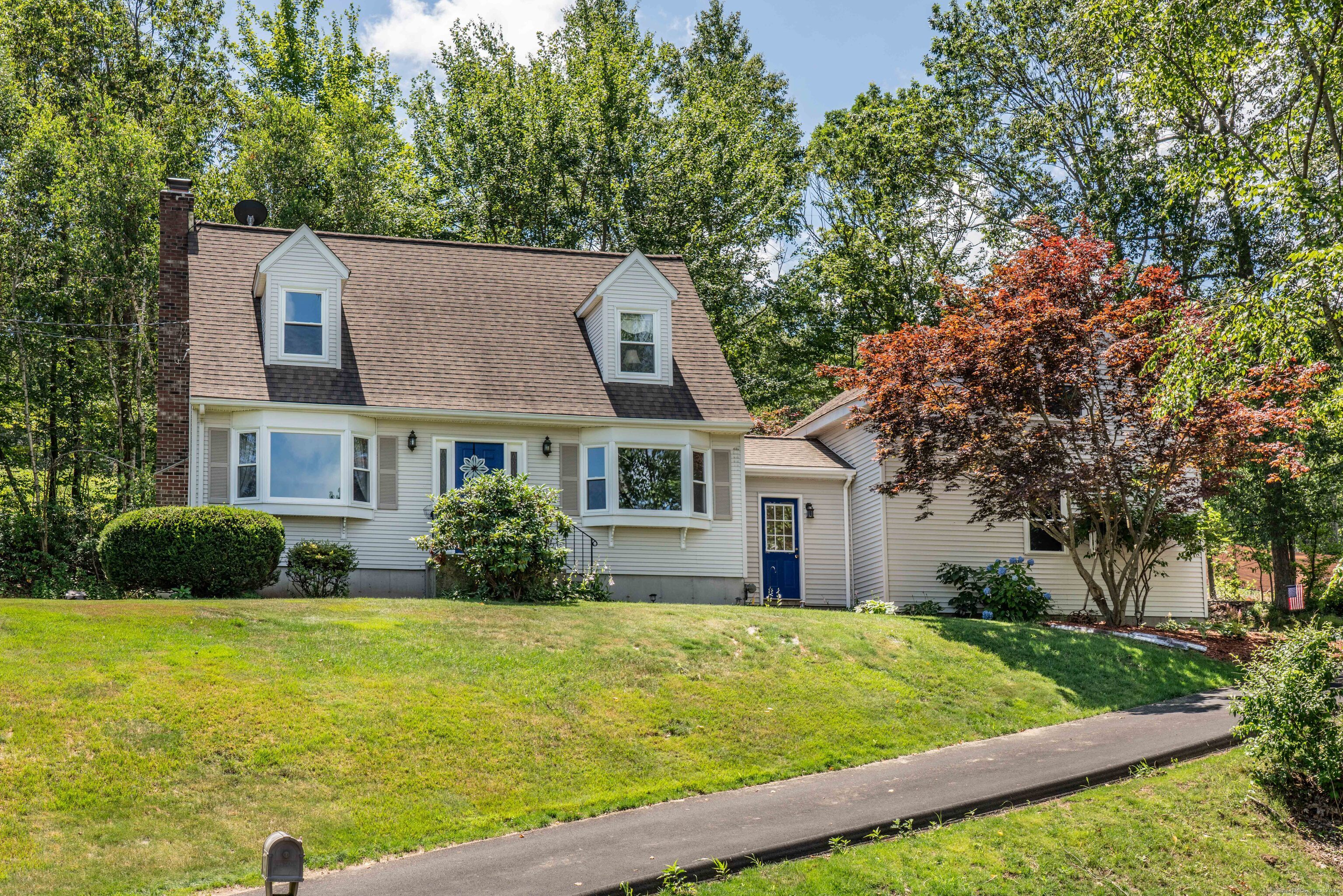 29 Northmont Rd Extension Bristol, CT 06010 - Photo 1 of 1 a front view of a house with garden