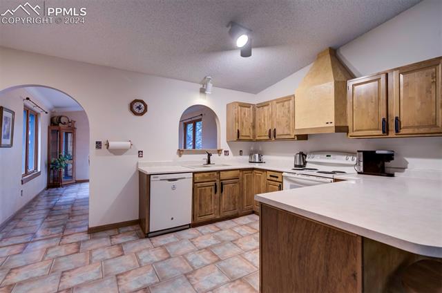18255 Stoneview Road Monument, CO 80132 - Photo 15 of 42 Kitchen with view to dining room