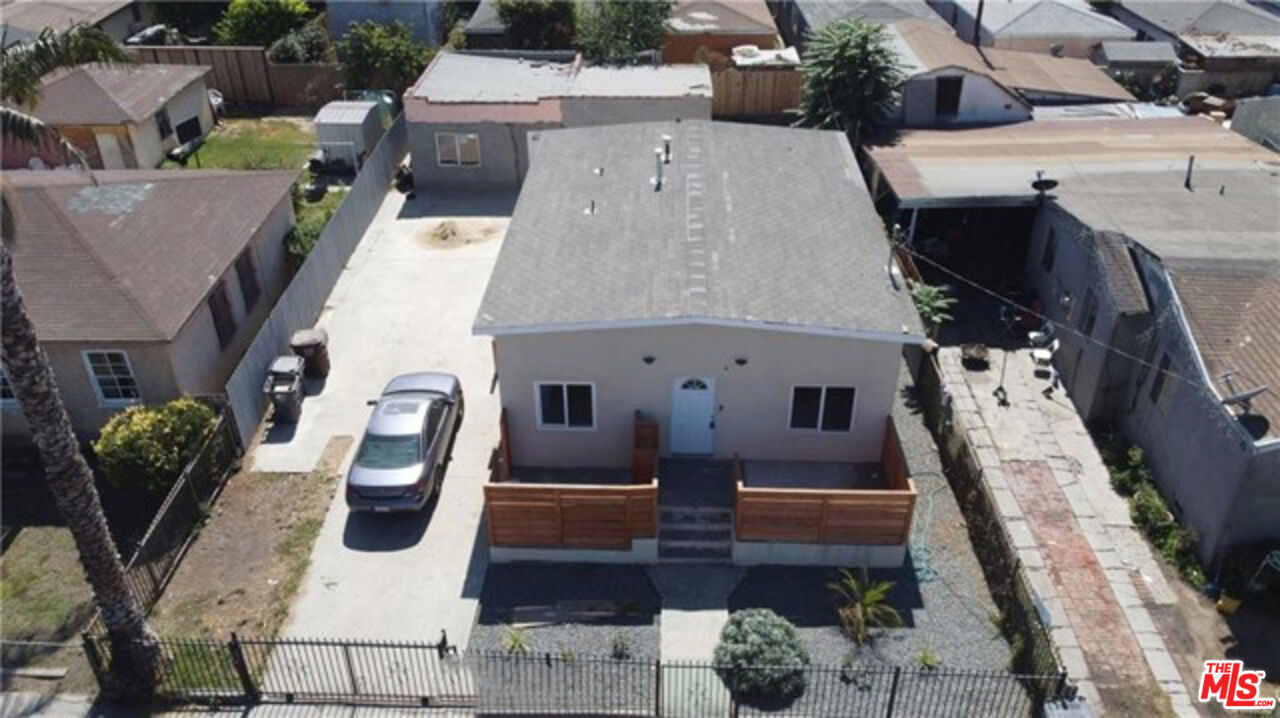 328 West Elm Street Compton, CA 90220 - Photo 12 of 12 an aerial view of a house with patio