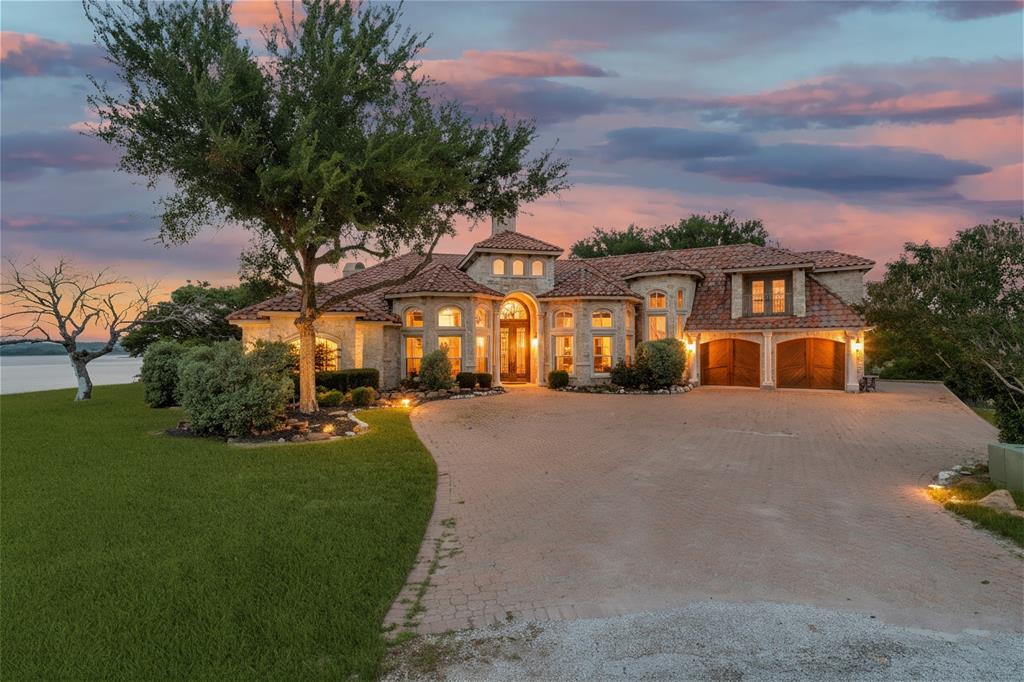 1237 Overlook Court Whitney, TX 76692 - Photo 18 of 20 a front view of a house with a yard