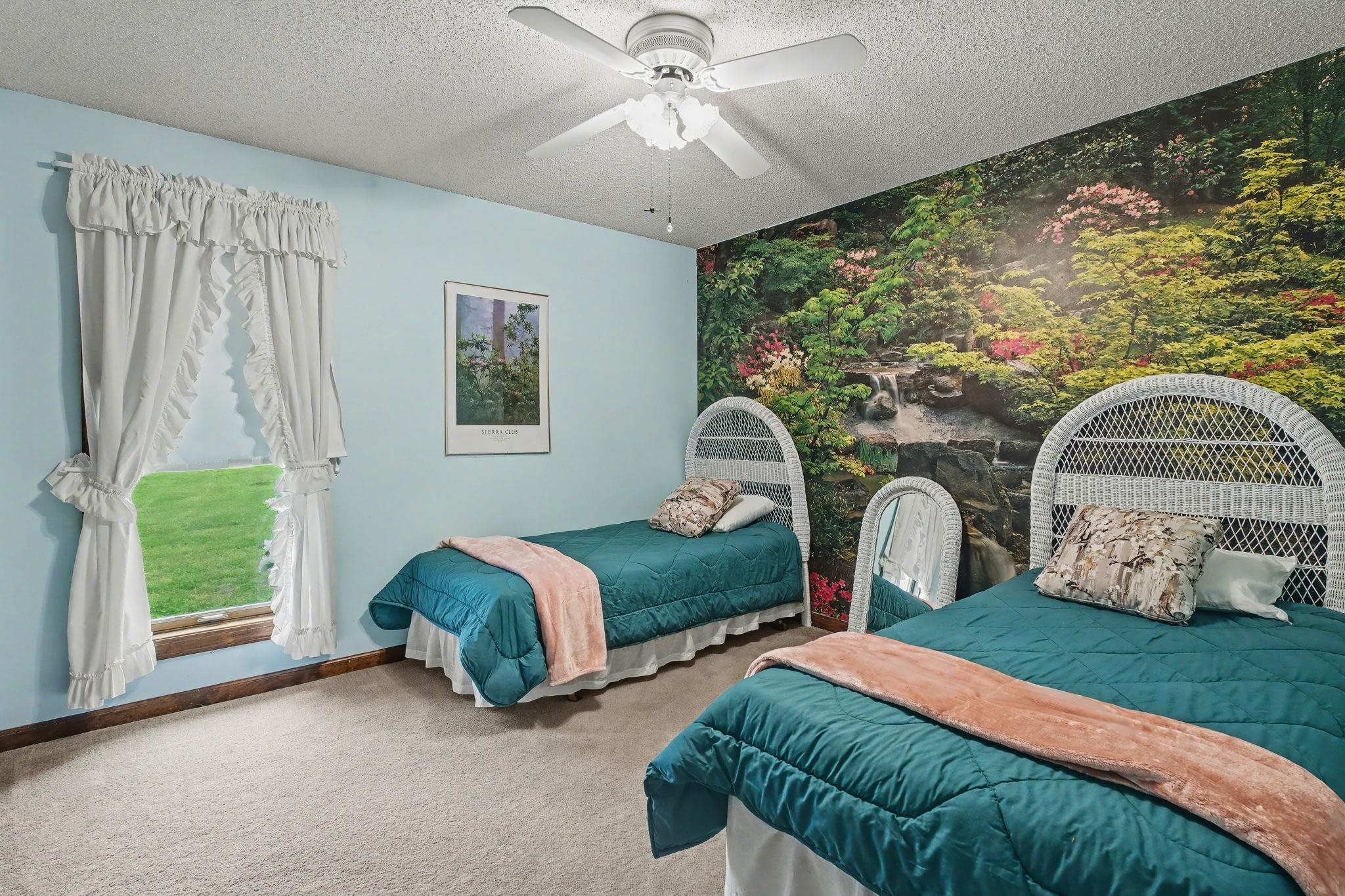 11380 Sycamore Farms Road Collierville, TN 38017 - Photo 27 of 38 Bedroom with an accent wall, carpet flooring, a textured ceiling, ceiling fan, and wallpapered walls