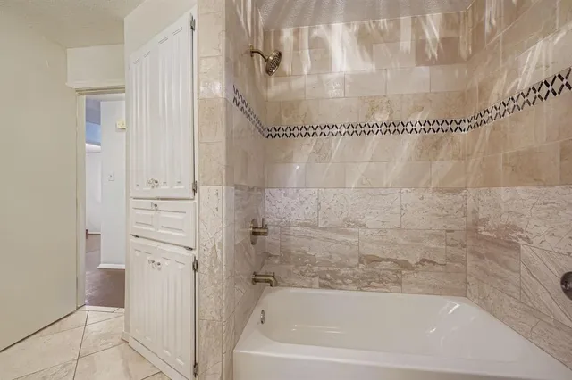 a bathroom with a bathtub