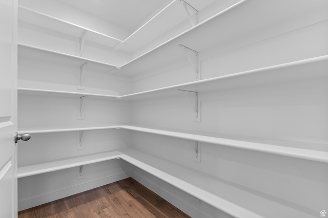 2829 North 710 West, Unit 15 Logan, UT 84321 - Photo 14 of 23 Spacious pantry with multiple white wire-frame shelves, providing extensive storage capacity