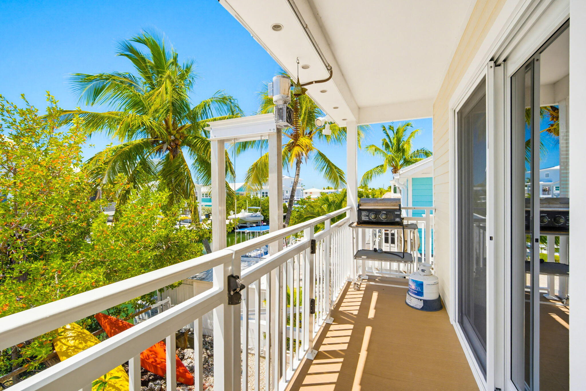 612 Blackbeard Road Summerland Key, FL 33042 - Photo 67 of 68 a view of balcony with wooden floor