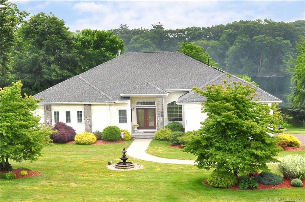 691 Prospect Hill Road Windsor, CT 06095 - Photo 1 of 1 a view of a house with a yard