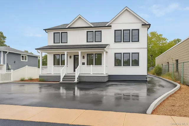 a front view of a house with yard