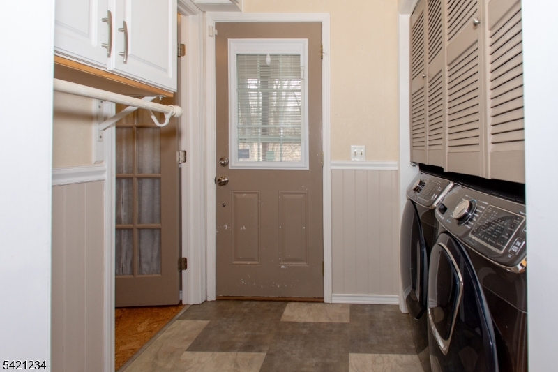 105 Valley Road Wantage, NJ 07461 - Photo 13 of 32 a view of walk in closet with clothes and shoes