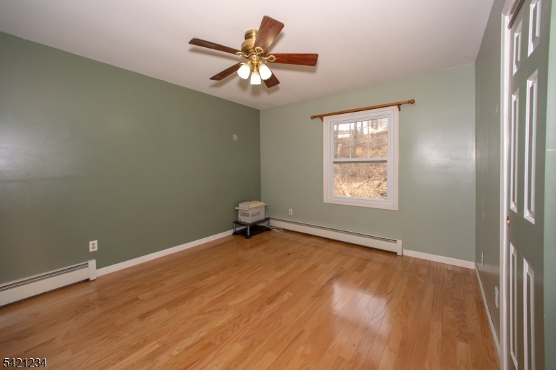 105 Valley Road Wantage, NJ 07461 - Photo 19 of 32 a view of an empty room with a window