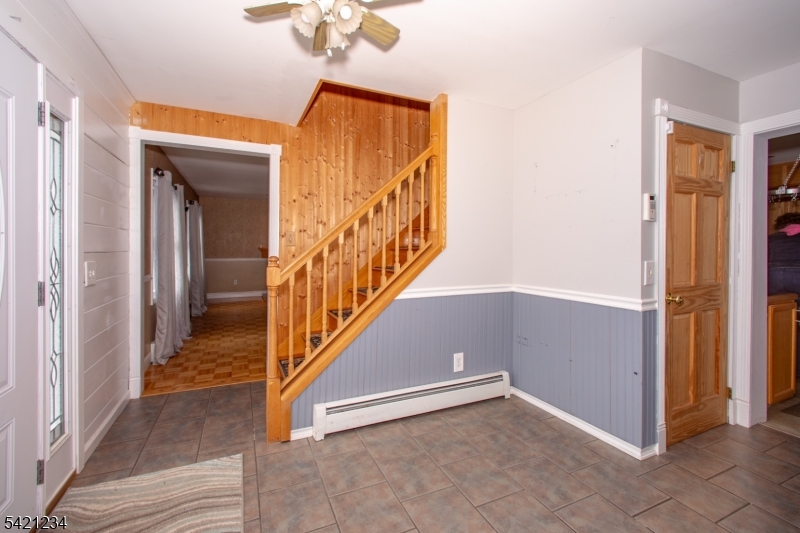 105 Valley Road Wantage, NJ 07461 - Photo 2 of 32 a view of a hallway with wooden floor and entryway